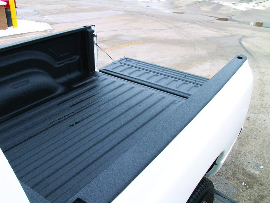 New truck bed coated for rust prevention before delivery